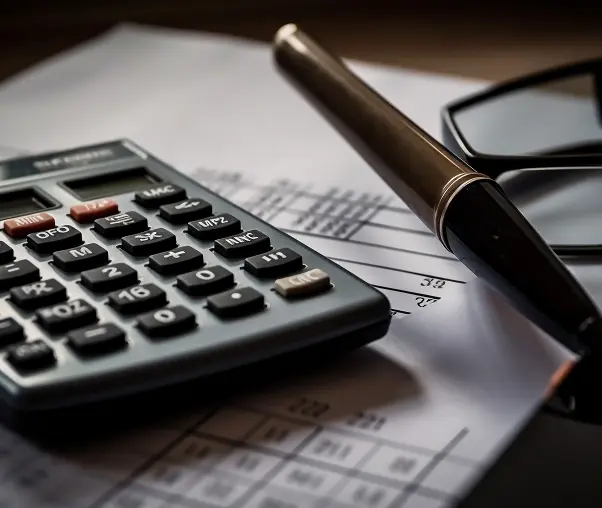 calculator-glasses-sit-top-piece-paper 1