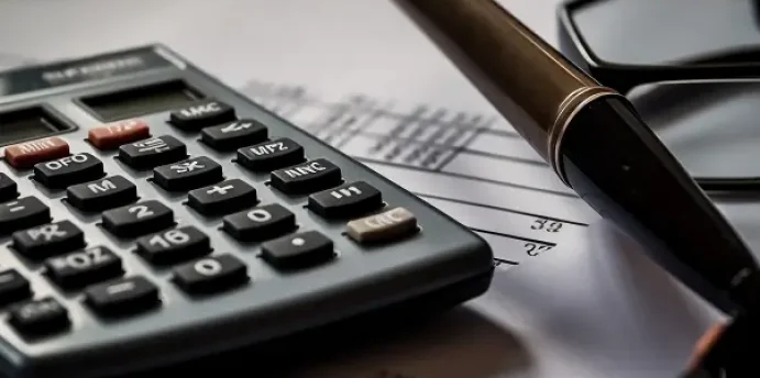 calculator-glasses-sit-top-piece-paper 1